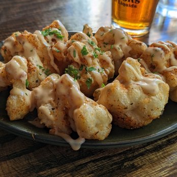 The Evergreen signature dishes Cauliflower Wings7oz Sirloin Steak SandwichSouthern Spicy Chicken